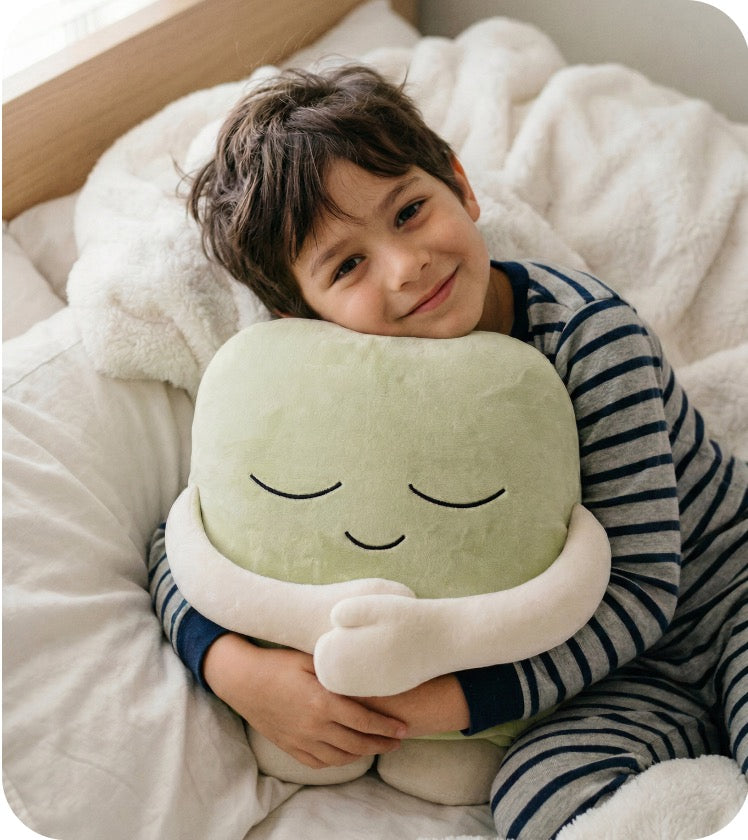 Child hugging a lil’ Hugster